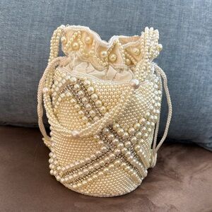 Elegant Pearl-Embellished Cream Bag